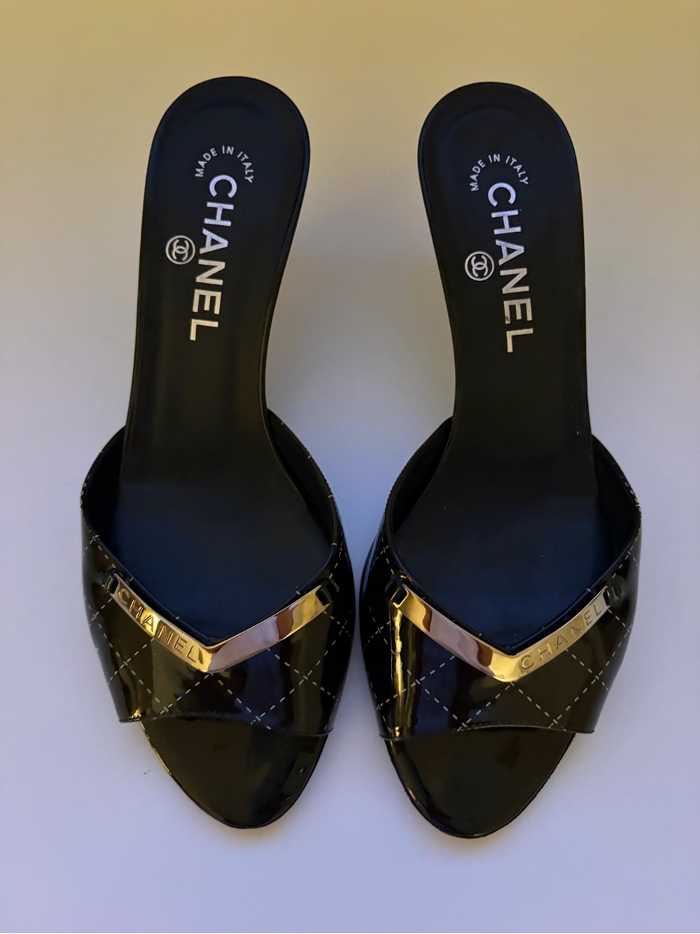 CHANEL Black Patent Leather Slide Mules with Gold-Tone Trim